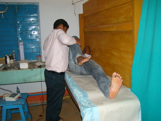 Biswajit Sahoo, Physiotherapist checking a patient