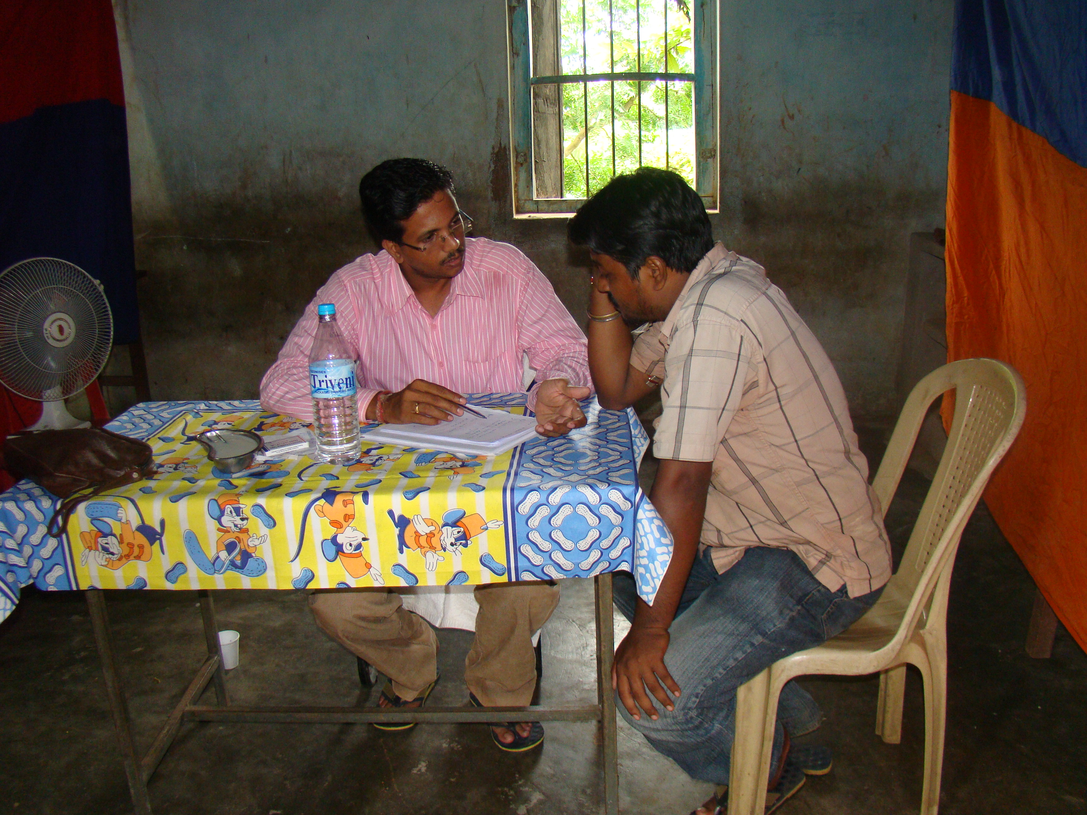 Dr. Abhilash Mohapatra attends to a patient