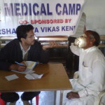 Dr. Abhilash Mohapatra attending to a patient