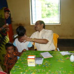 Dr. Bimal Chandra Rath attends to a patient