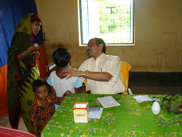 Dr. Bimal Chandra Rath attends to a patient