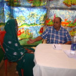 Dr. Dharanidhara Mishra attending to a patient