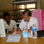 Dr. P C Mohanty attends to a patient