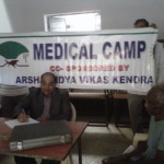 Prof. Dharanidhara Mishra attending to a patient