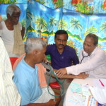 Prof. R N Sahoo attending to a patient