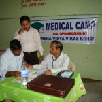 Prof. R N Sahoo attending to a patient