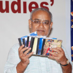Prof. Braja Kishore Swain showing the set of Audio cds-2009