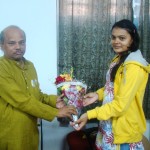 Prof. Godabarisha Mishra being presented a bouquet